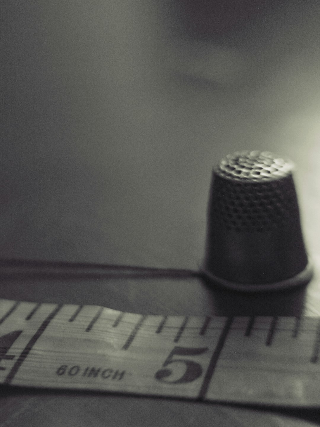 gallery-3 vintage-thimble-and-measuring-tape-in-sepia-tones-zekj7mceaq0